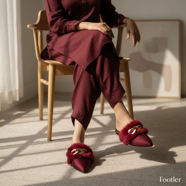 Elegant fur mules designed