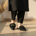 Elegant fur mules designed