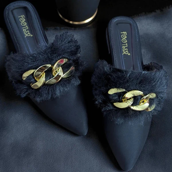 Elegant fur mules designed