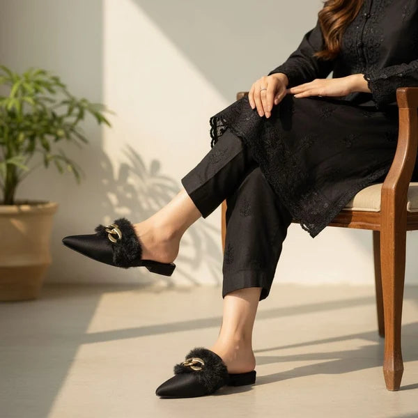 Elegant fur mules designed