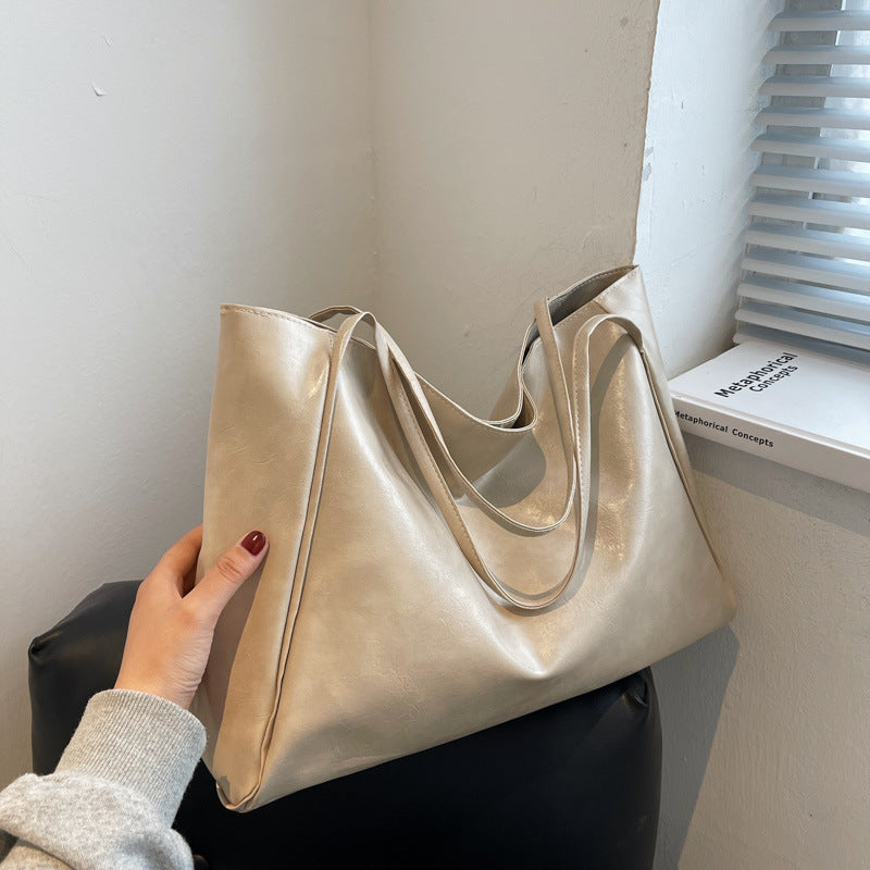 Solid color bag for women 2023 autumn new European and American Retro Fashion Tote Bag glossy large capacity commuter shoulder bag