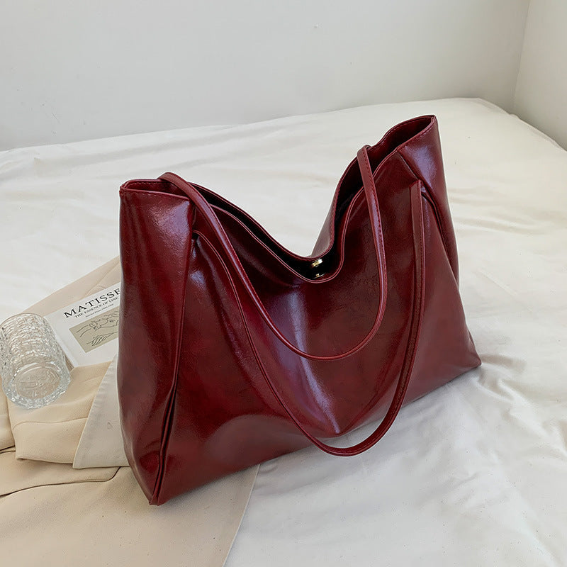 Solid color bag for women 2023 autumn new European and American Retro Fashion Tote Bag glossy large capacity commuter shoulder bag