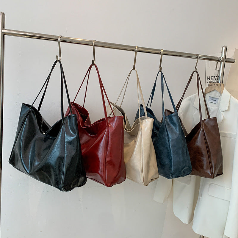 Solid color bag for women 2023 autumn new European and American Retro Fashion Tote Bag glossy large capacity commuter shoulder bag