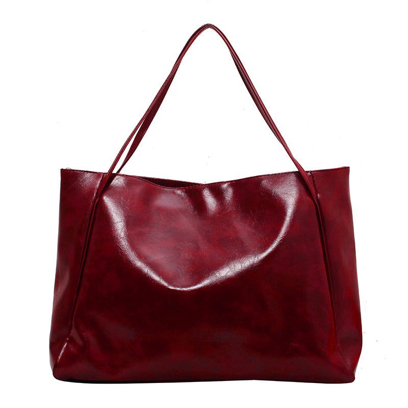 Solid color bag for women 2023 autumn new European and American Retro Fashion Tote Bag glossy large capacity commuter shoulder bag